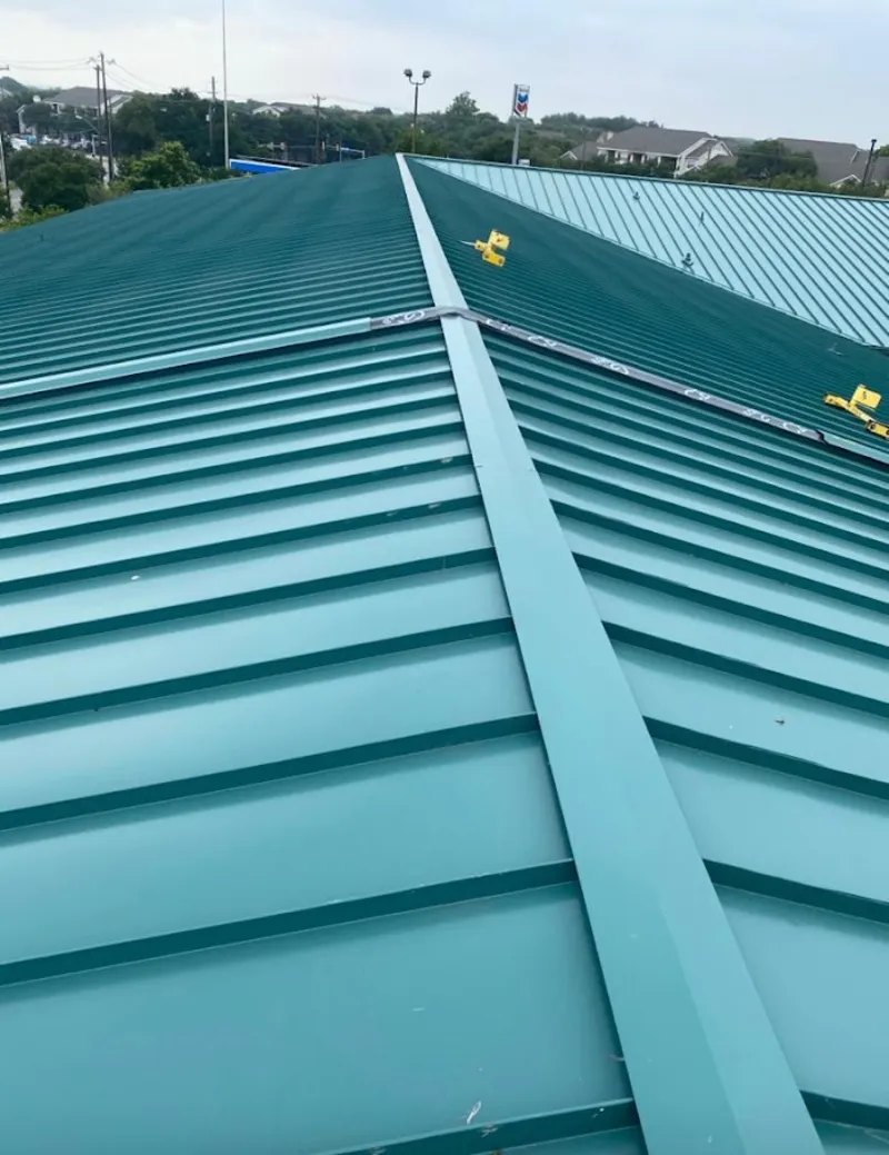 Green commercial metal roof ridge and valley for Metal Roof Repair in Dayton